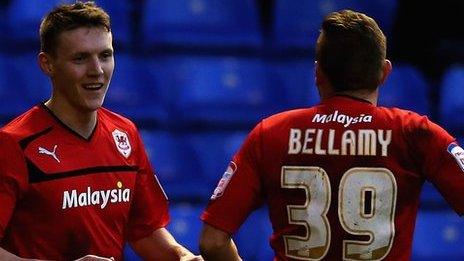 Joe Mason is congratulated by Craig Bellamy