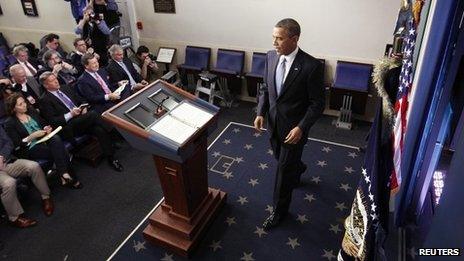 President Barack Obama arrives at the lectern to deliver remarks after the House of Representatives acted on legislation intended to avoid the "fiscal cliff" at the White House, Washington DC, 1 January 2013