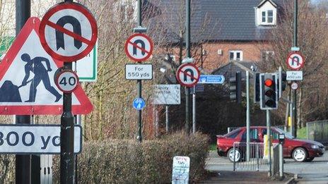 Road signs on the A419 in Gloucestershire