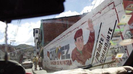 A mural of President Hugo Chavez in Caracas on 2 January 2012