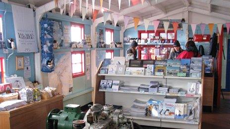 Customers browsing in Port Lockroy's store