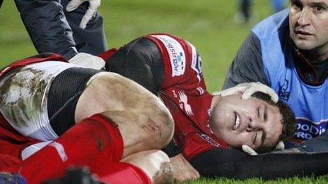George North receives treatment at Ravenhill