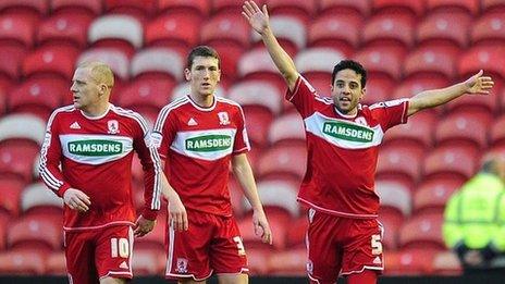 Merouane Zemmama (r) celebrates