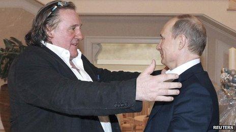 Russian President Vladimir Putin (R) greets French actor Gerard Depardieu in Sochi, 5 January