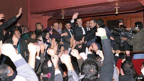 Bashar al-Assad is mobbed at the end of his address