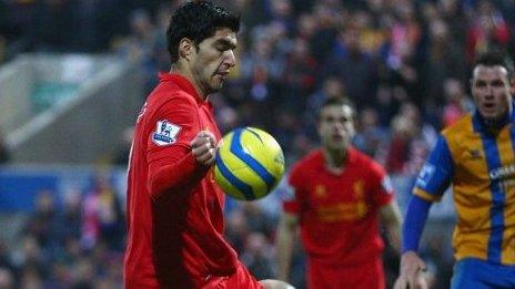 Luis Suarez scores Liverpool's second