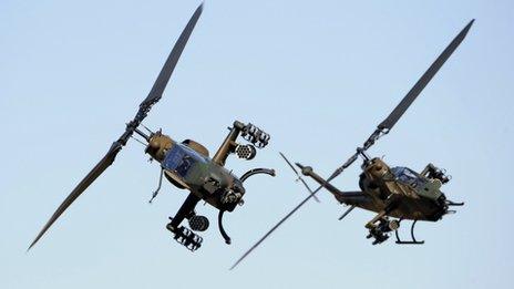 File picture of Japanese AH-1S helicopters on drill in Tokyo, 8 January 2012