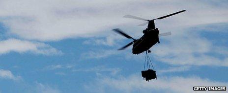 Chinook carrying supplies