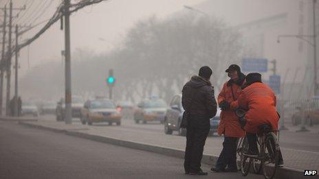 Parking attendants in Beijing on 12 January.