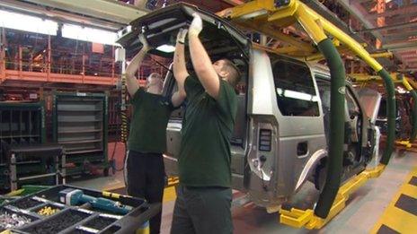 Jaguar Land Rover workers on the production line