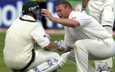England's Andrew Flintoff consoles Australia's Brett Lee