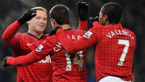 Manchester United's English striker Wayne Rooney celebrates scoring the only goal