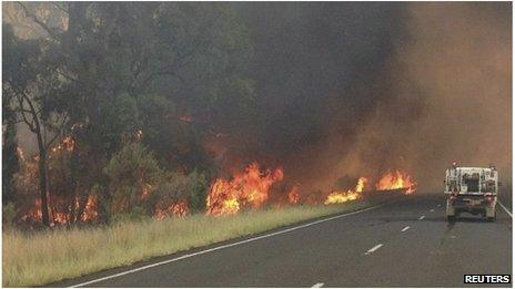 The Redbank North Fire burns alongside the Newell Highway near Coonabarabran, NSW Australia (16 Jan 2013)