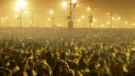 Tens of thousands of Hindu devotees crowd a large field on the banks of the Sangham or confluence of the Yamuna and Ganges rivers as they surge forward slowly and hope to take a dip in the waters during the Kumbh Mela in Allahabad on January 14, 2013.