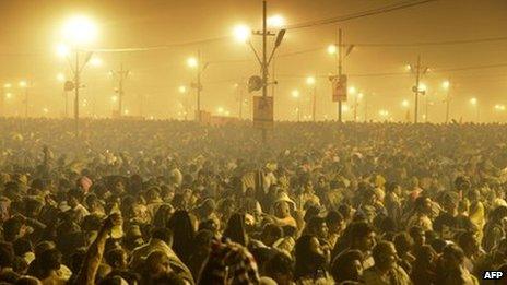 Tens of thousands of Hindu devotees crowd a large field on the banks of the Sangham or confluence of the Yamuna and Ganges rivers as they surge forward slowly and hope to take a dip in the waters during the Kumbh Mela in Allahabad on January 14, 2013.