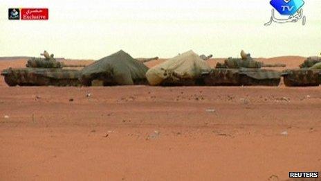 TV image of tanks near the scene of the siege in Algeria on 17/1/13