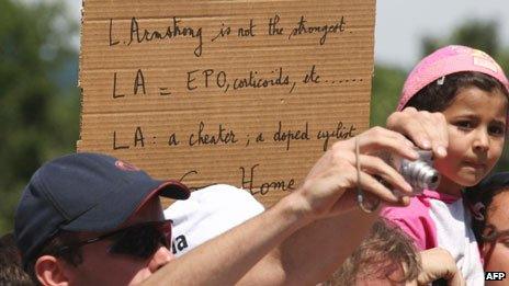 Placard denouncing Lance Armstrong, 2009