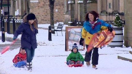 children on sledges