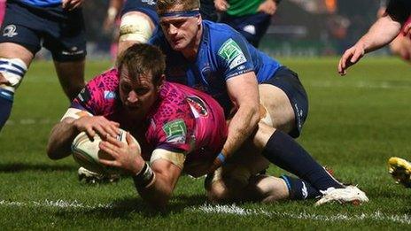 Neil Clark dives over for Leinster's first try