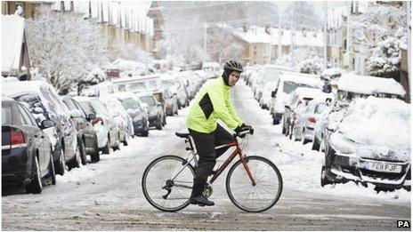 A cyclist in the snow