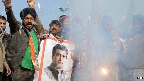 Congress party members set off firecrackers as they celebrate the appointment of Rahul Gandhi as Congress party Vice-President, in Amritsar on January 20, 2013.