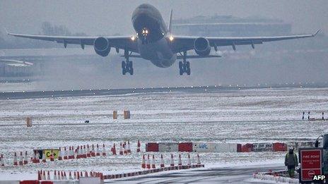 A plane takes off at Heathrow Airport on Monday