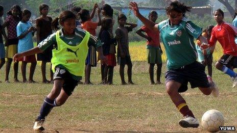 Yuwa girls playing a match