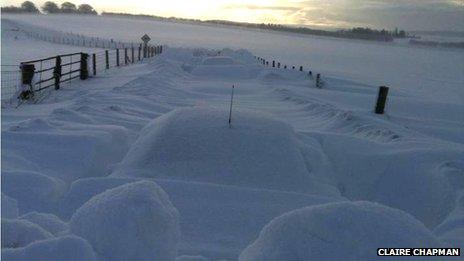 Car under snow in Daviot