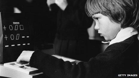 Boy using a school computer in 1981