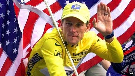 Lance Armstrong celebrates after winning the 2000 Tour de France