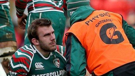 Tom Croft gets treatment during Saturday's game against Wasps