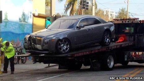 Damaged car on car transporter