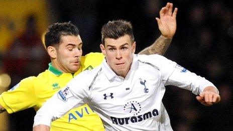 Gareth Bale challenged by Bradley Johnson