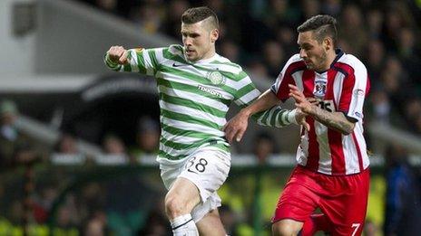 Gary Hooper holds off Kilmarnock's Danny Racchi