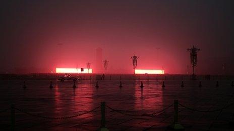 Flag-raising ceremony on Beijing's Tiananmen Square during severe pollution