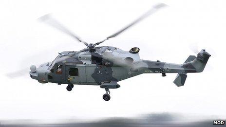 Royal Navy Wildcat Attack helicopter in flight, Wildcat HMA Mk2 maiden flight , Somerset, Jan 2013