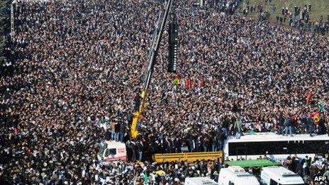 Thousands of Kurds gather to carry the coffins of the three top Kurdish activists Sakine Cansiz, Fidan Dogan and Leyla Soylemez, shot dead in the French capital, on January 17 in Diyarbakir.