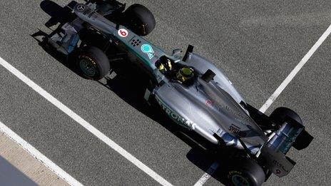 Mercedes driver Nico Rosberg rides the new Mercedes W04 Formula One car around the track before its official presentation at the Jerez racetrack