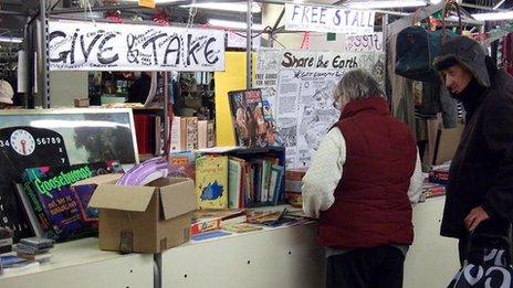 Customers browsing at the Give and Take stall