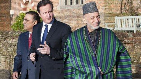 Prime Minister David Cameron (centre) with President Hamid Karzai (right) and President Asif Ali Zardari of Pakistan (left)