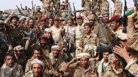 Army personnel pose after the end of three days of firefights with al-Qaeda fighters near the town of Shuqra in Yemen's southern province of Abyan (image provided by Yemeni Defence Ministry)