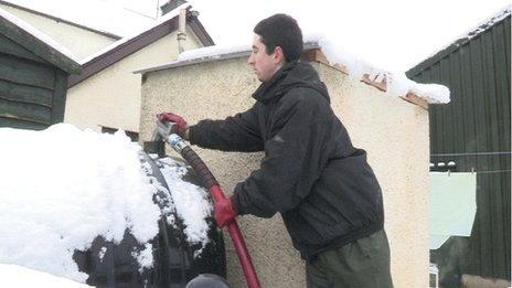 Oil tank being filled