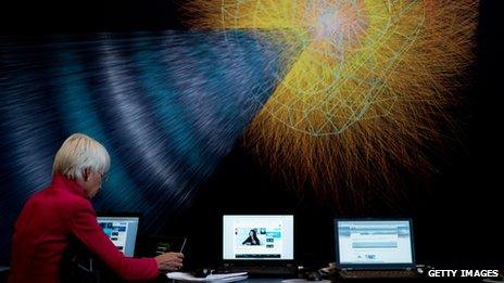 Woman using screens during a presentation at the World Economic Forum in Davos