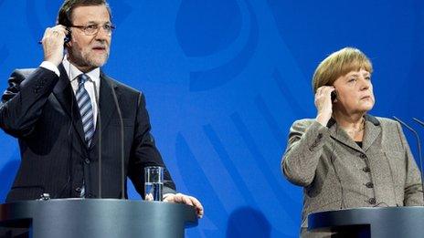 German Chancellor Angela Merkel (r) and Spanish Prime Minister Mariano Rajoy