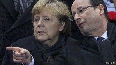 Angela Merkel and Francois Hollande at an international football friendly in France (6 February 2013)