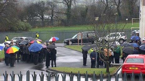 Mourners gathering