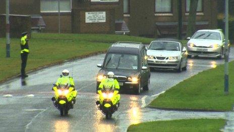 Hearse arriving