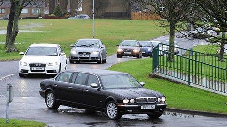 Mourners arriving for the funeral