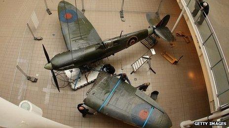 Spitfire being dismantled at the Imperial War Museum in London