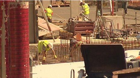 Workers on building site